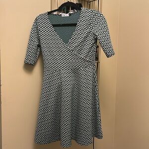 White diamond print Green and black dress